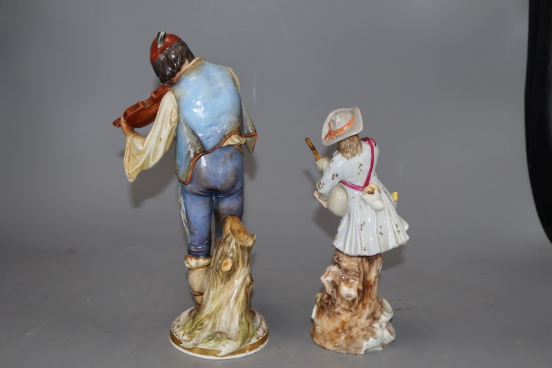 A Meissen figure of a fiddler, model R147 and another porcelain figure, tallest 24cm